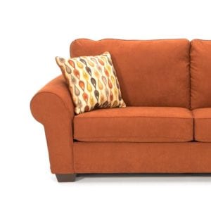 desert orange love seat couch with accent pillow product photography example