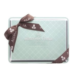 Honolulu cookie in clear blue and brown container in grocery and food product photography example